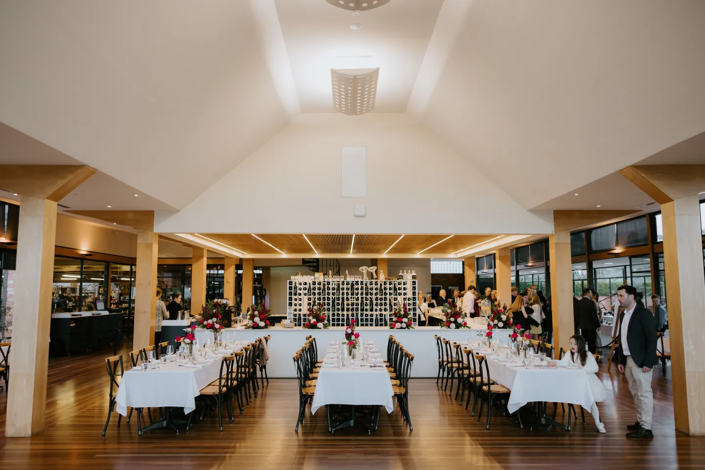Long dining tables and bar at Isabella’s Restaurant