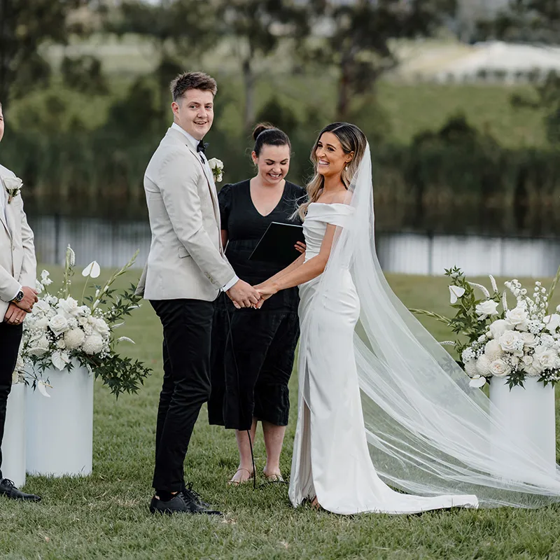 Couple getting married in garden ceremony