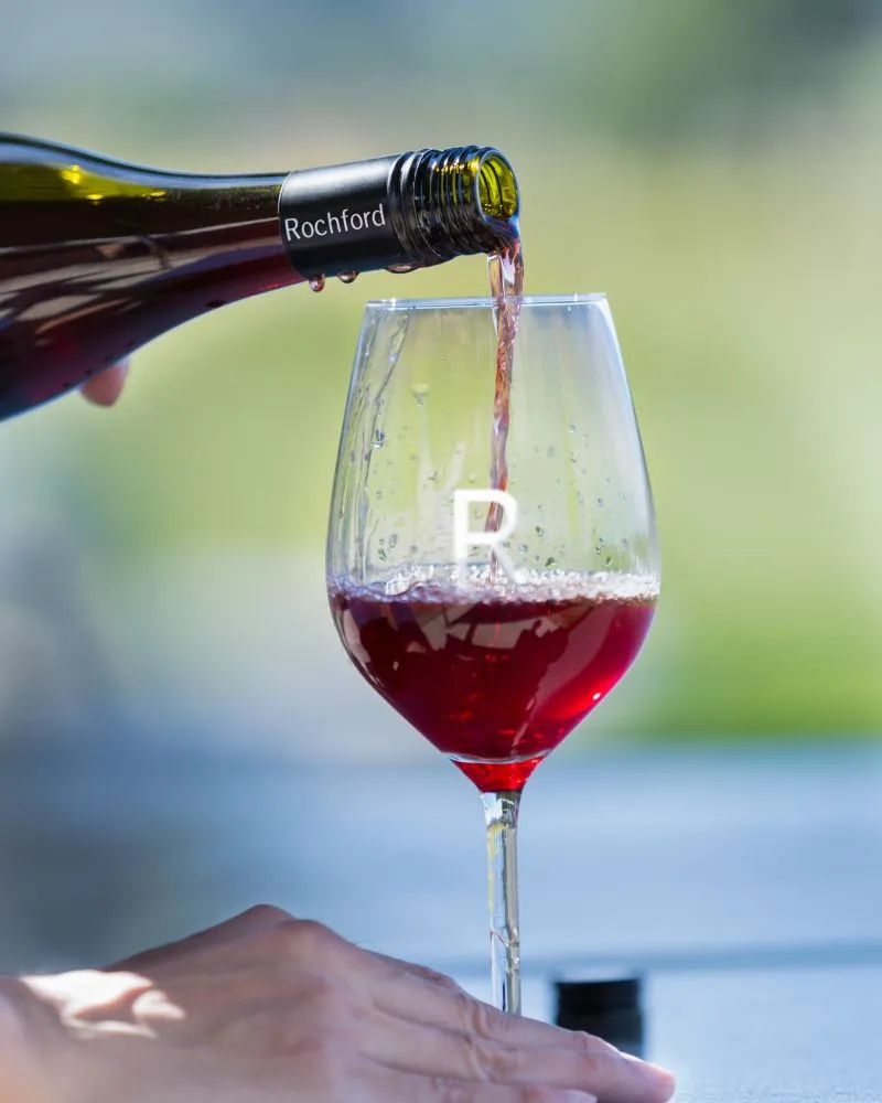 Pouring Rochford Red Wine