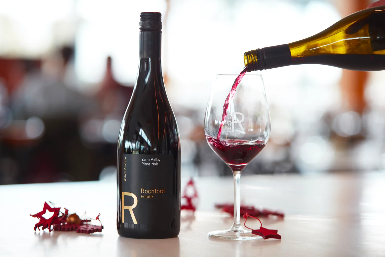 Rochford Estate Pinot Noir poured into a wine glass