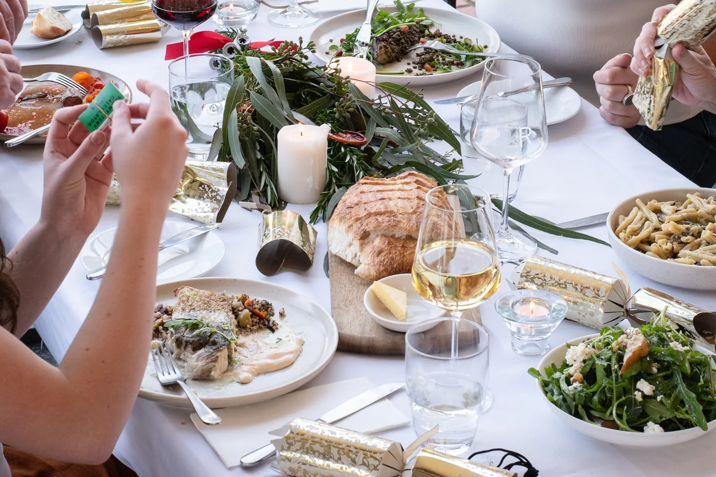 Festive table with Rochford wine, candles and eucalyptus