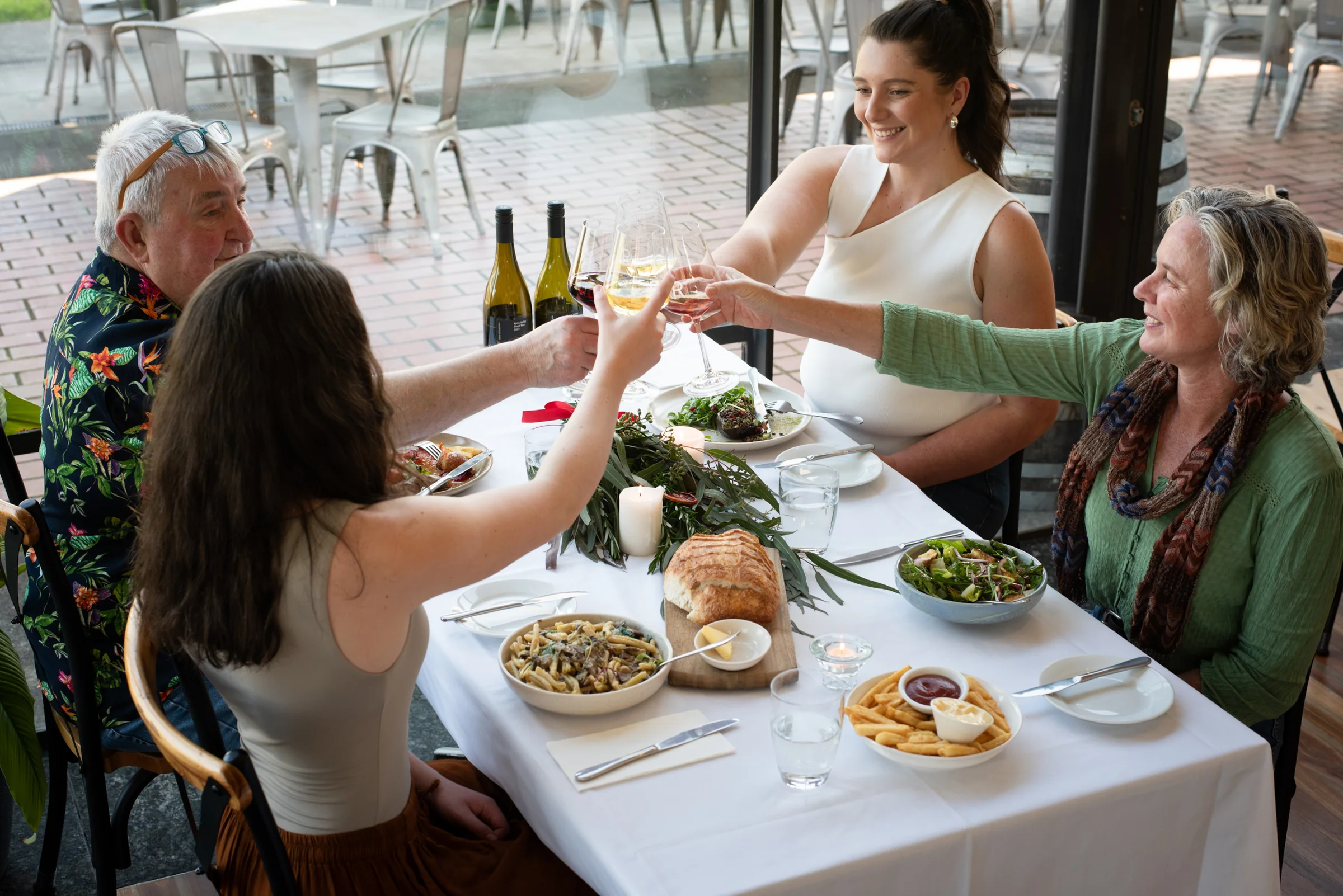 Family raising a Christmas toast at Rochford Wines